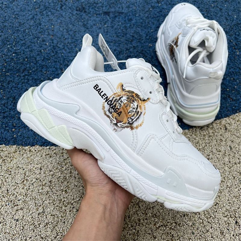 Ba*len*cia*ga triple s x g*u*i tiger print sneaker in white