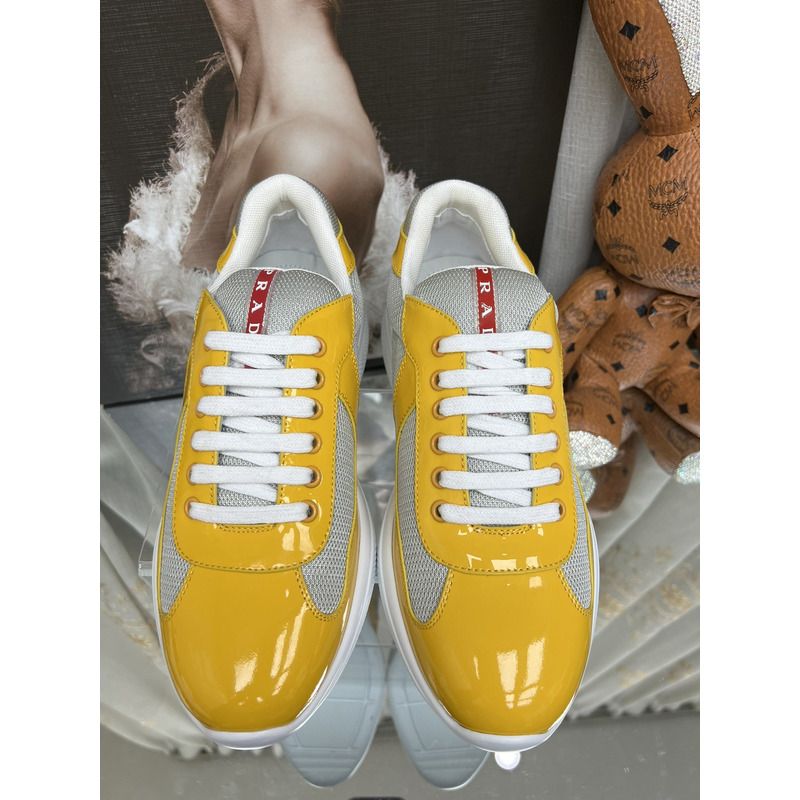 Pra*a americas cup sneakers gold/silver