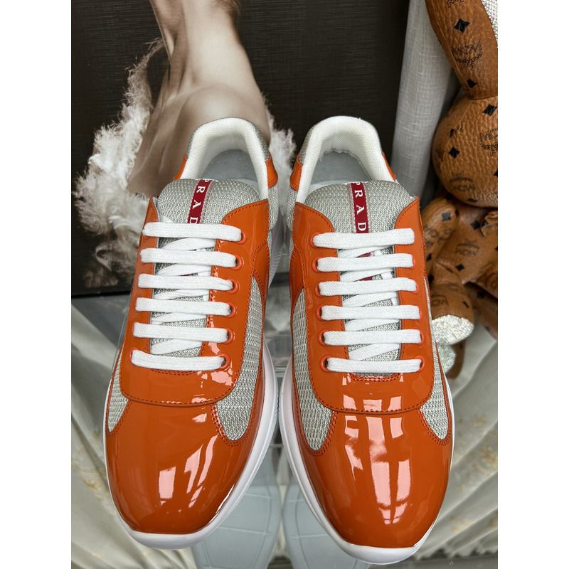 Pra*a america’s cup sneakers orange