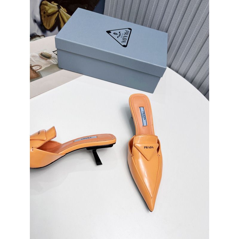 Pra*a logo patent leather pointy toe mule in orange