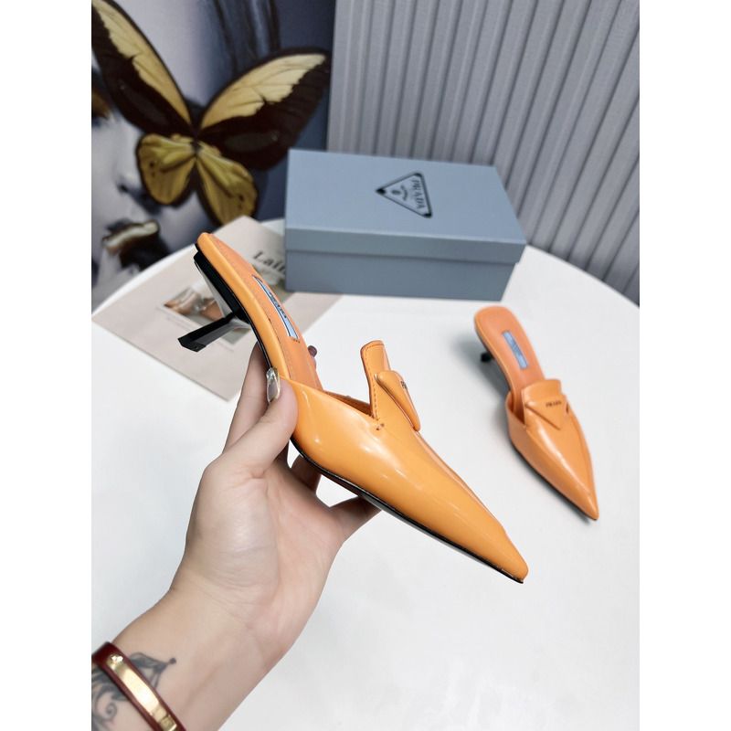 Pra*a logo patent leather pointy toe mule in orange