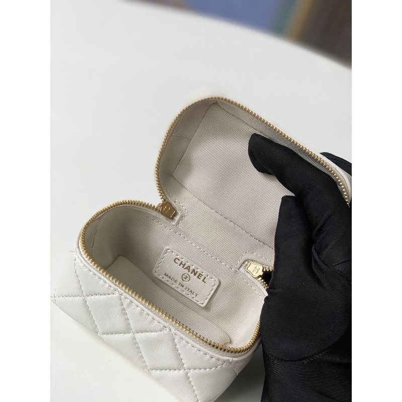 Ch*el small vanity case with top handle gold tone metal white