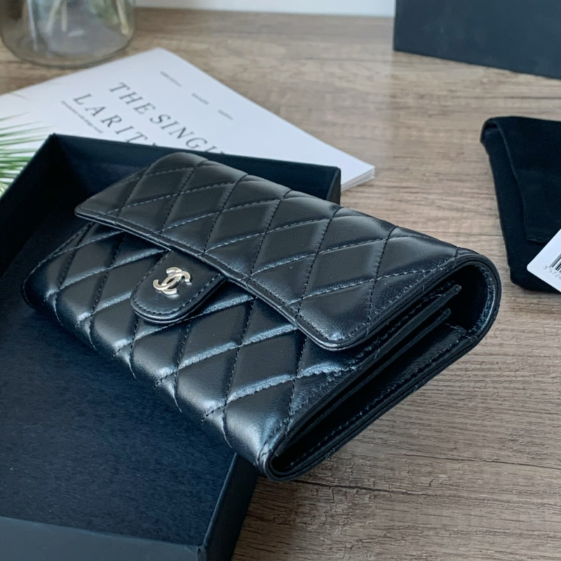 Ch*el classic long flap wallet in caviar with silver tone metal black