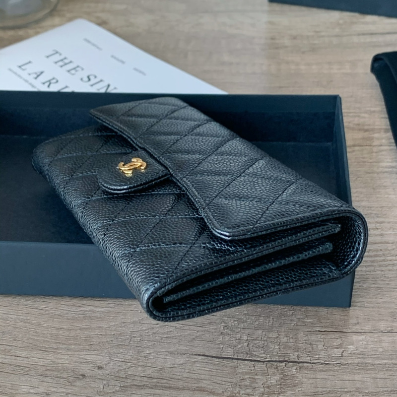 Ch*el classic long flap wallet in caviar with gold tone metal black