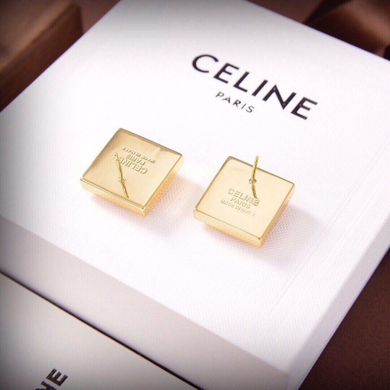 Ce**e globe earrings gold