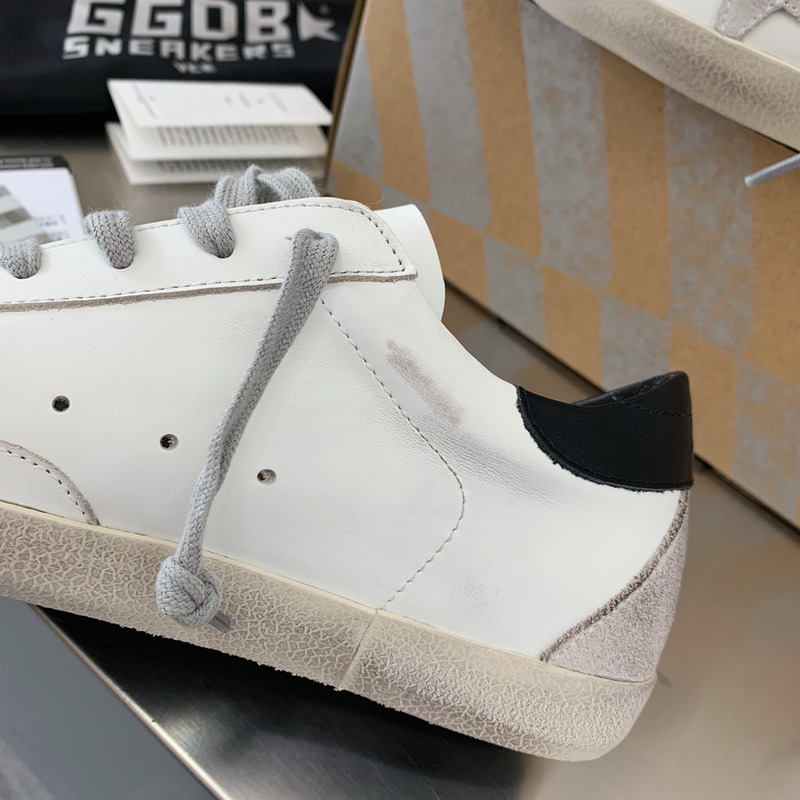 Golden Goose Men’s Super-Star Sneakers with Suede Star and Black Heel Tab