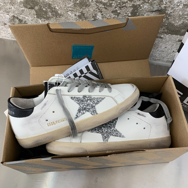 Golden Goose Super-Star Sneakers with Sliver Glitter and Black Heel Tab