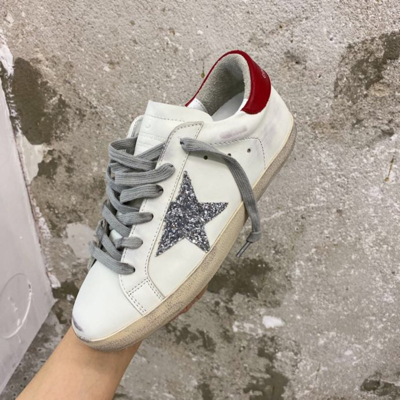 Golden Goose Super-Star Sneakers with Sliver Glitter and Red Heel Tab