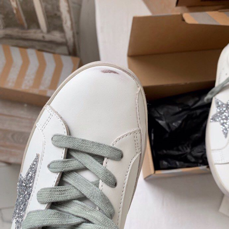 Golden Goose Super-Star Sneakers with Sliver Glitter and Black Heel Tab