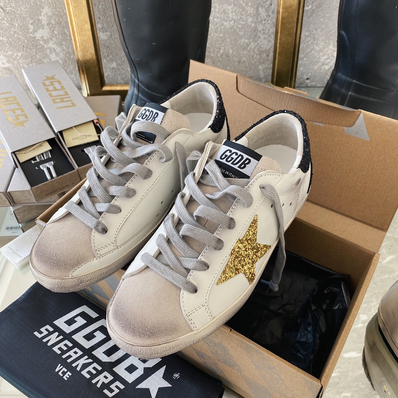 Golden Goose Super-Star Sneakers with Golden Glitter and Black Heel Tab