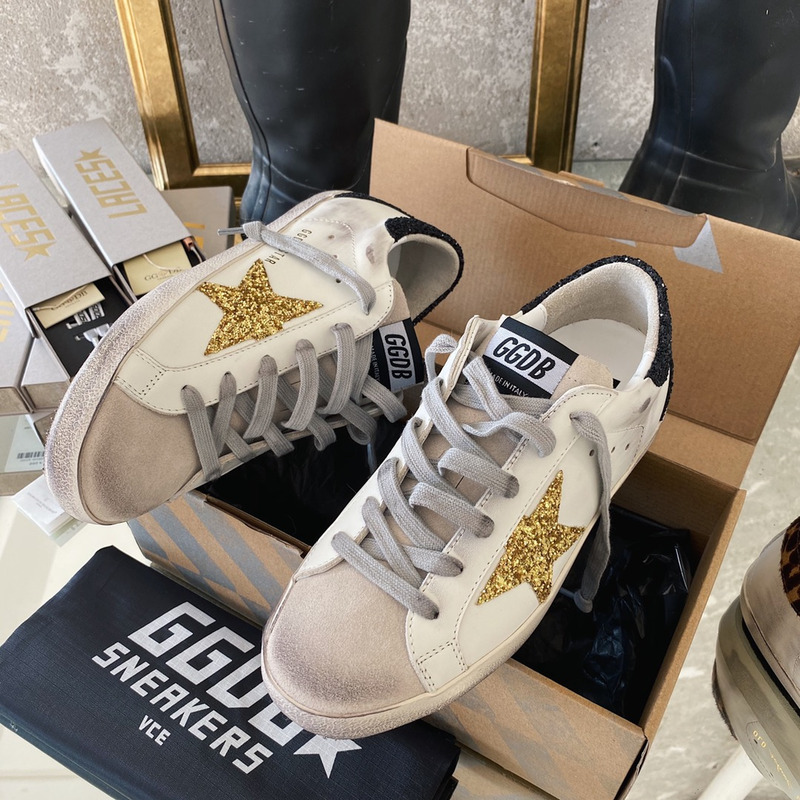 Golden Goose Super-Star Sneakers with Golden Glitter and Black Heel Tab