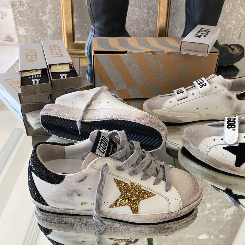 Golden Goose Super-Star Sneakers with Golden Glitter and Black Heel Tab