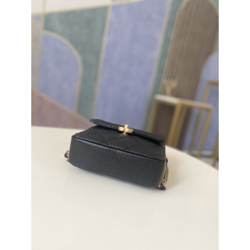 Ch*el  grained calfskin & gold-tone metal backpack black