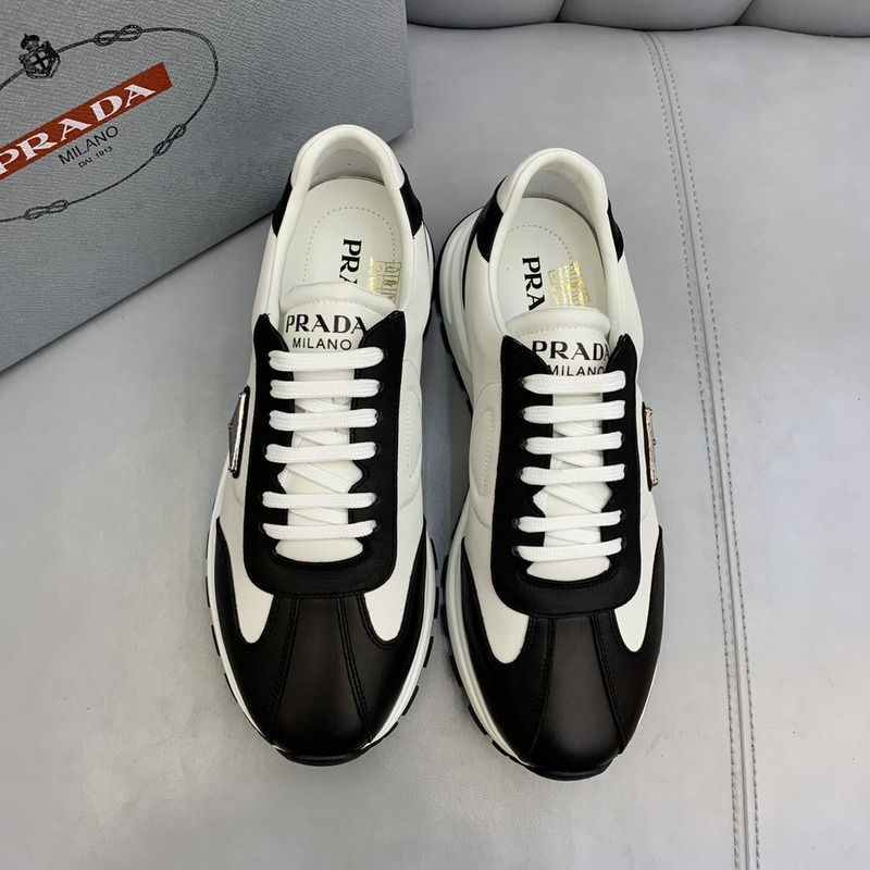 Pra*a logo leather sneakers black & white