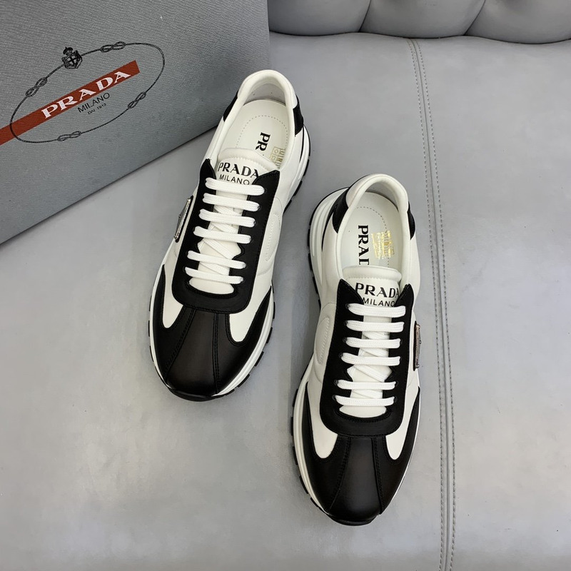 Pra*a logo leather sneakers black & white