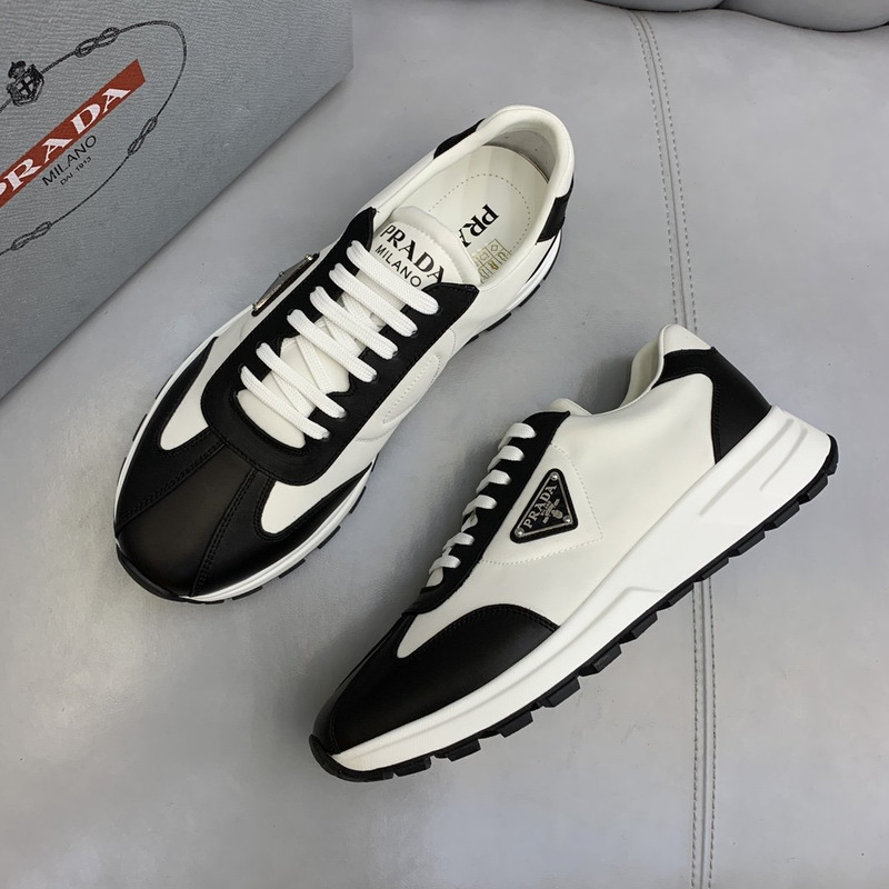 Pra*a logo leather sneakers black & white