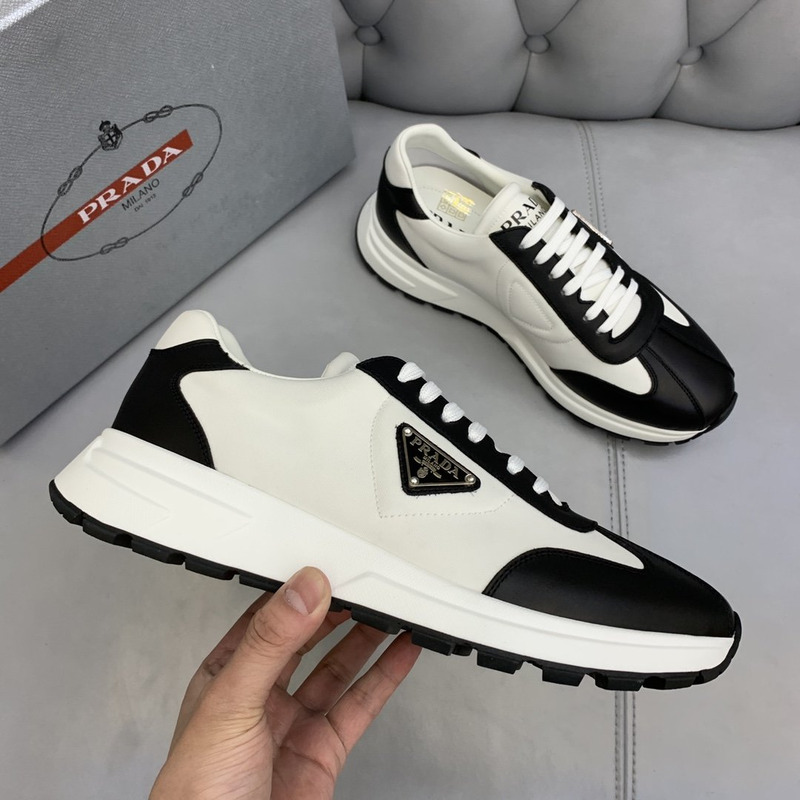 Pra*a logo leather sneakers black & white