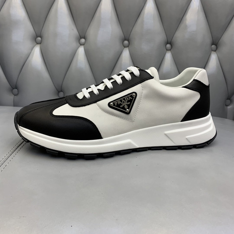 Pra*a logo leather sneakers black & white