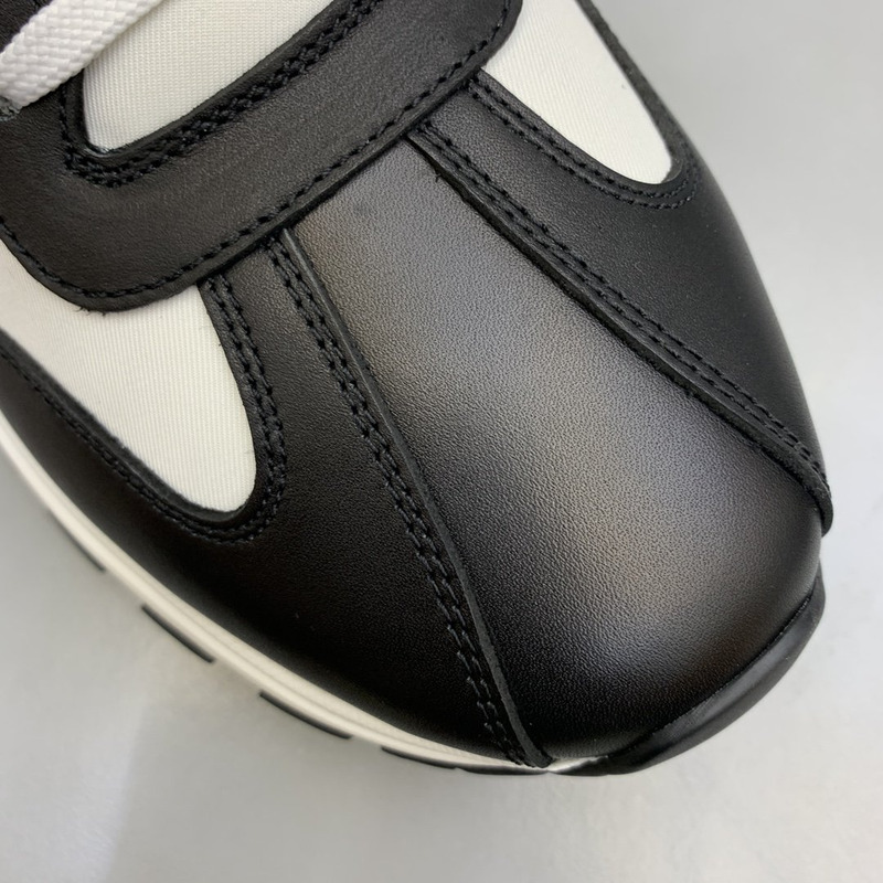 Pra*a logo leather sneakers black & white