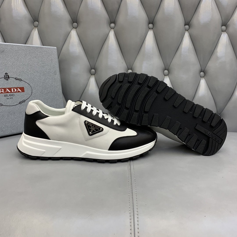 Pra*a logo leather sneakers black & white