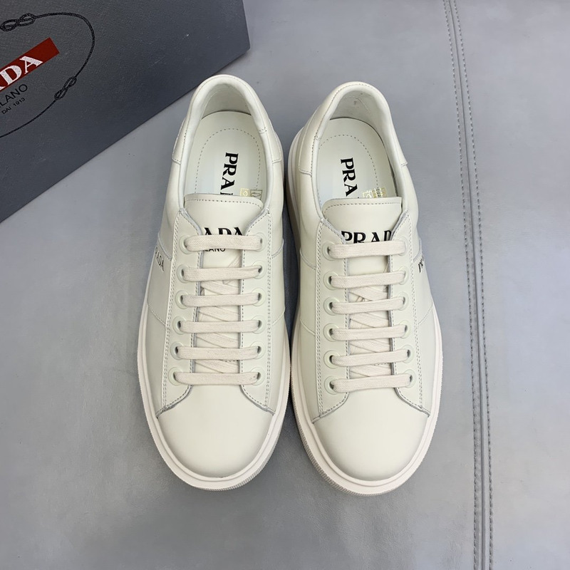 Pra*a unisex plain leather logo low-top sneakers white