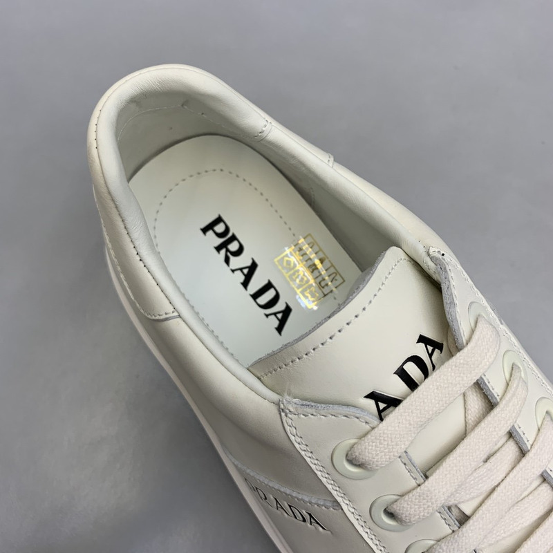 Pra*a unisex plain leather logo low-top sneakers white