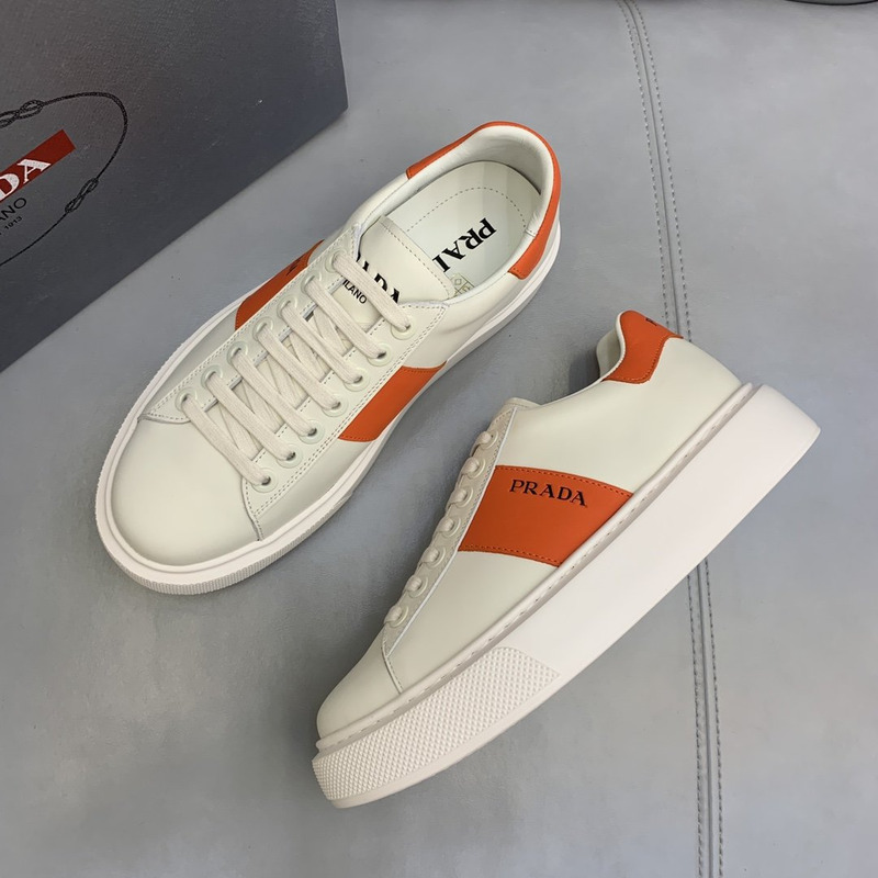 Pra*a unisex plain leather logo low-top sneakers orange