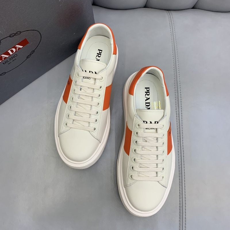 Pra*a unisex plain leather logo low-top sneakers orange