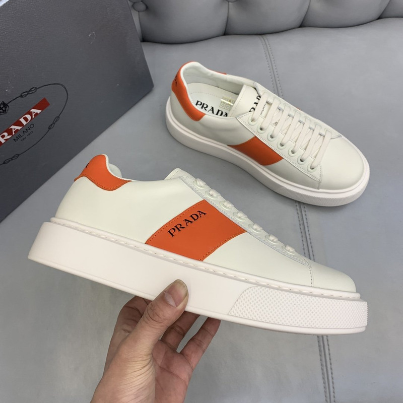 Pra*a unisex plain leather logo low-top sneakers orange