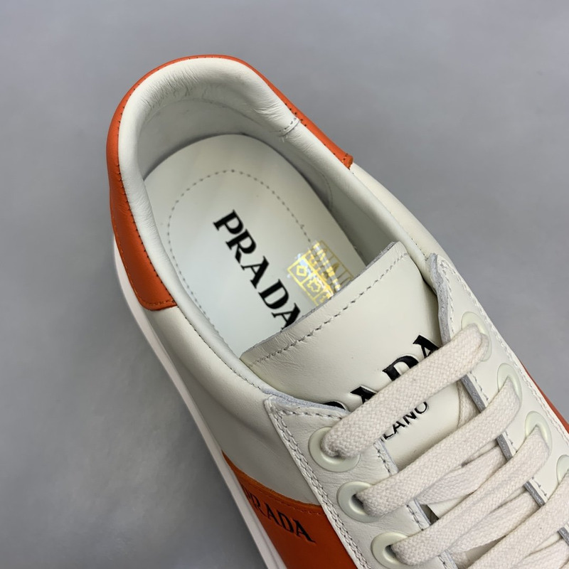 Pra*a unisex plain leather logo low-top sneakers orange