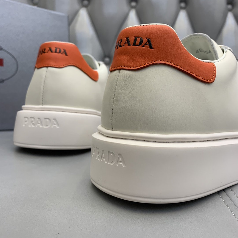 Pra*a unisex plain leather logo low-top sneakers orange