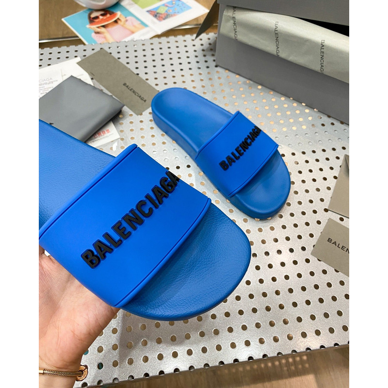 Ba*len*cia*ga pool slide sandal in blue smooth rubber with black 3d Ba*len*cia*ga logo