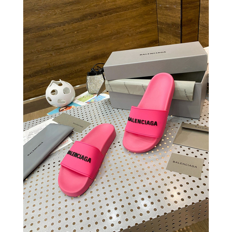 Ba*len*cia*ga piscini logo-embossed rubber sliders in fuchsia