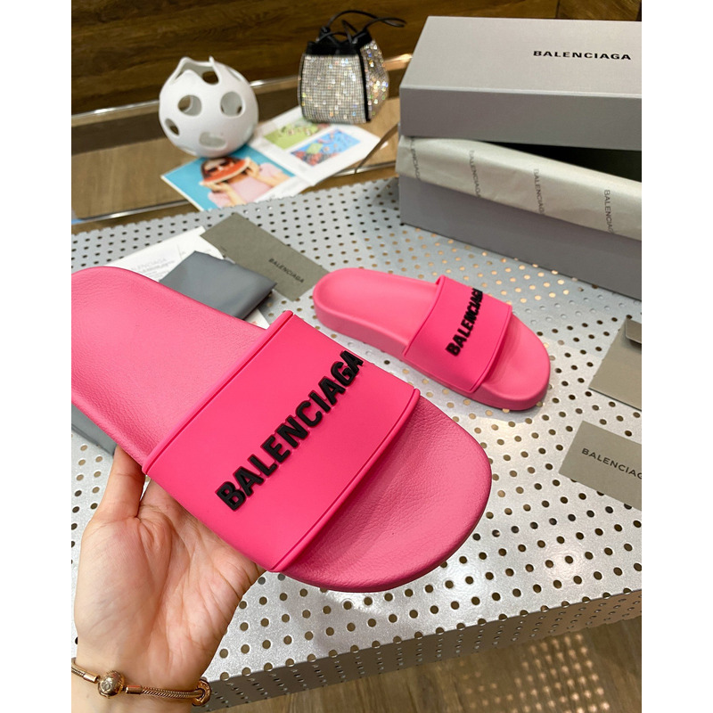 Ba*len*cia*ga piscini logo-embossed rubber sliders in fuchsia