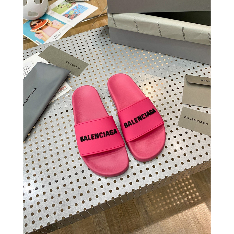 Ba*len*cia*ga piscini logo-embossed rubber sliders in fuchsia