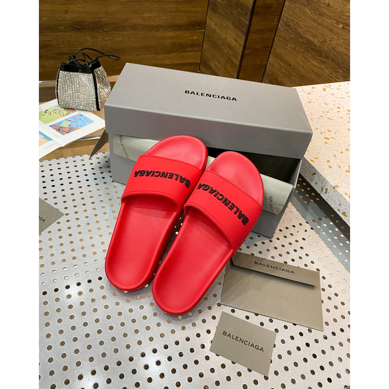 Ba*len*cia*ga pool slide sandal in red smooth rubber with black 3d Ba*len*cia*ga logo