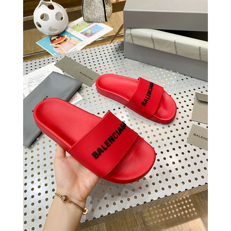 Ba*len*cia*ga pool slide sandal in red smooth rubber with black 3d Ba*len*cia*ga logo