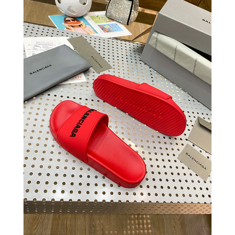 Ba*len*cia*ga pool slide sandal in red smooth rubber with black 3d Ba*len*cia*ga logo