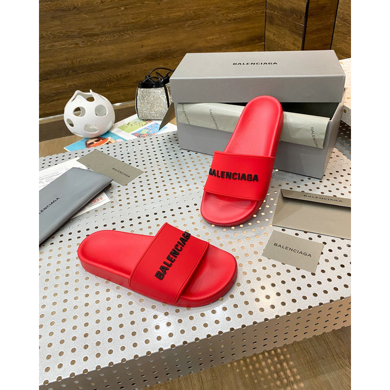 Ba*len*cia*ga pool slide sandal in red smooth rubber with black 3d Ba*len*cia*ga logo