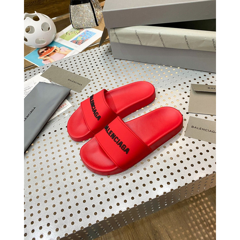 Ba*len*cia*ga pool slide sandal in red smooth rubber with black 3d Ba*len*cia*ga logo