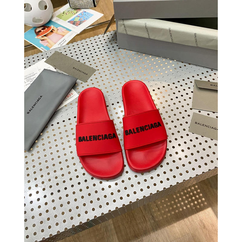 Ba*len*cia*ga pool slide sandal in red smooth rubber with black 3d Ba*len*cia*ga logo