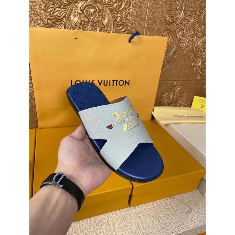 l**is V*t*n gold logo mules grey/blue