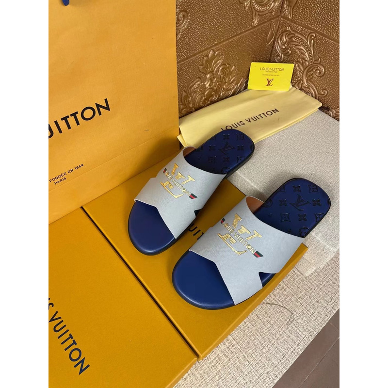 l**is V*t*n gold logo mules grey/blue