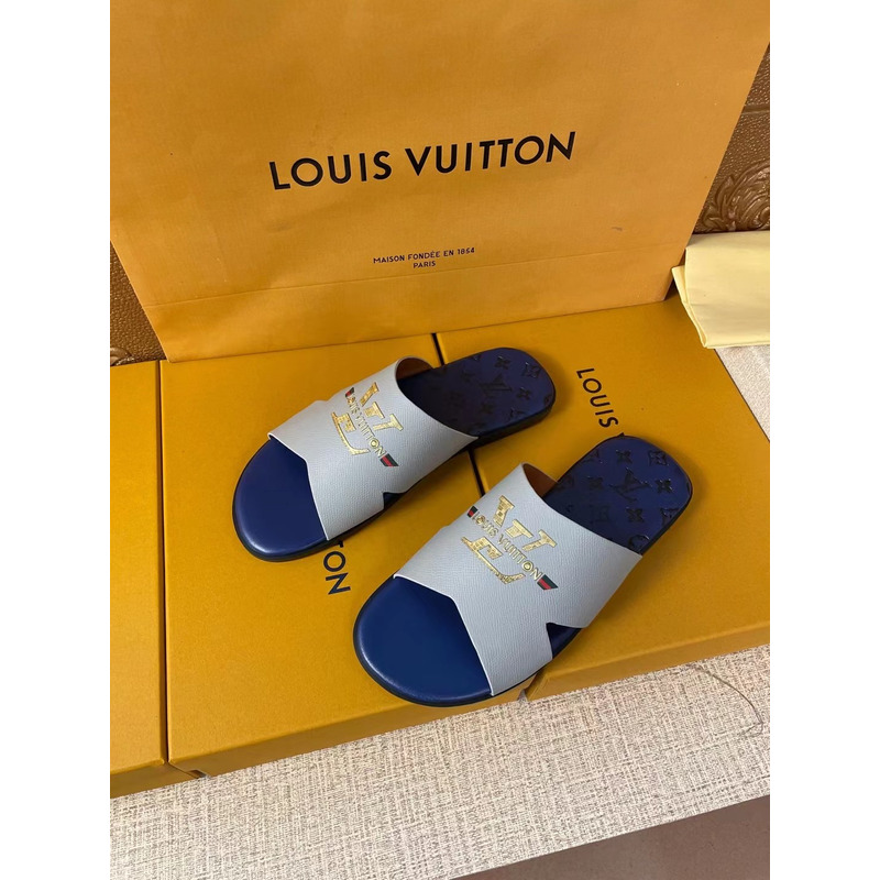 l**is V*t*n gold logo mules grey/blue