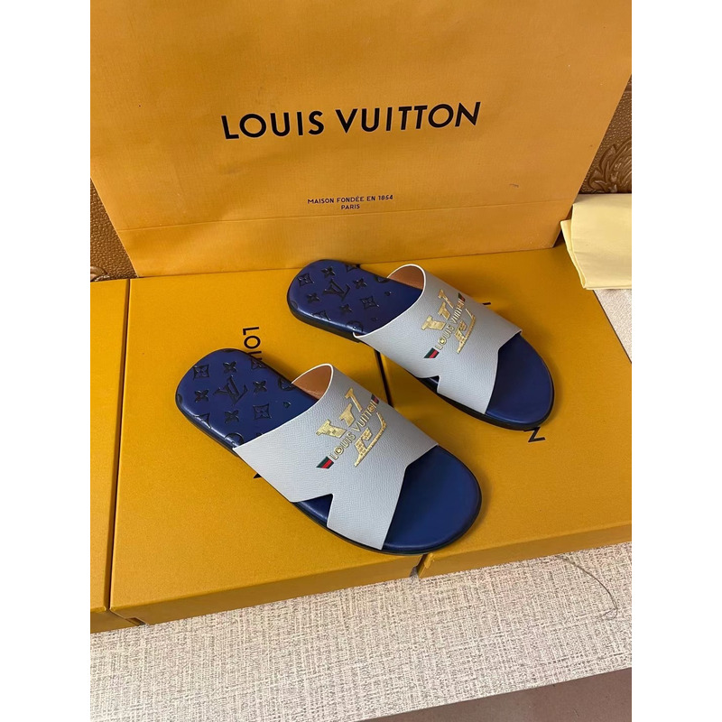 l**is V*t*n gold logo mules grey/blue