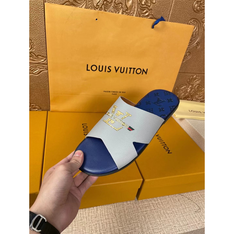 l**is V*t*n gold logo mules grey/blue