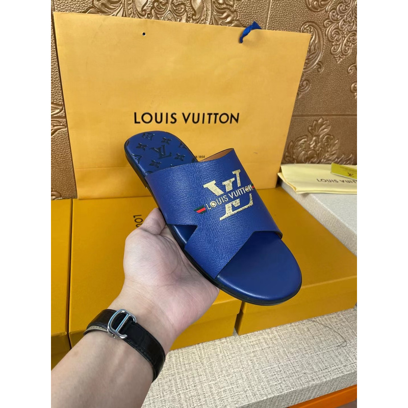 l**is V*t*n gold logo mules blue