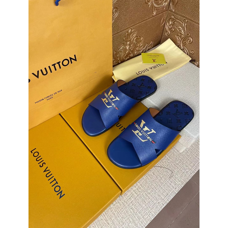 l**is V*t*n gold logo mules blue