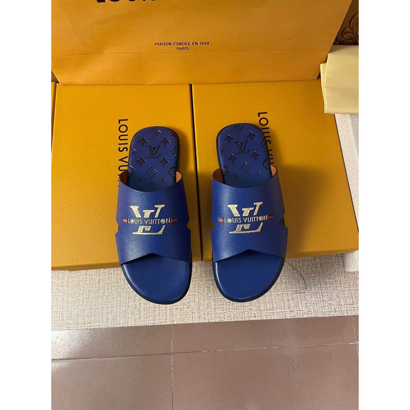 l**is V*t*n gold logo mules blue