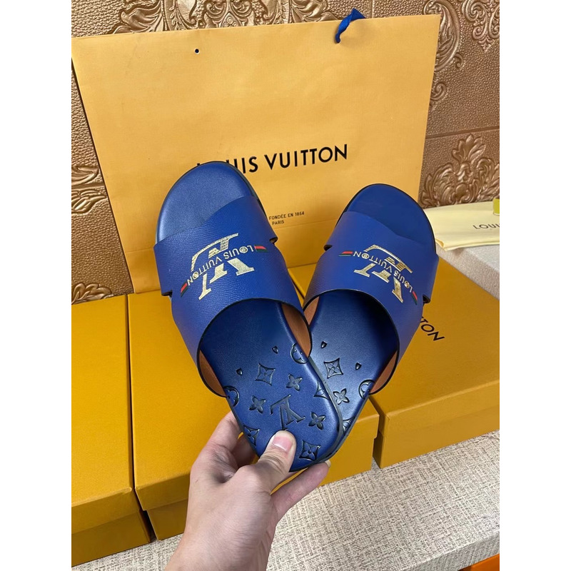 l**is V*t*n gold logo mules blue